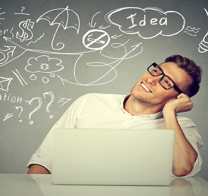 man happily brainstorming